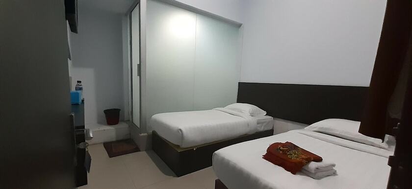 Imagen de la habitación del Hotel Capital O 93291 Bintang. Foto 16