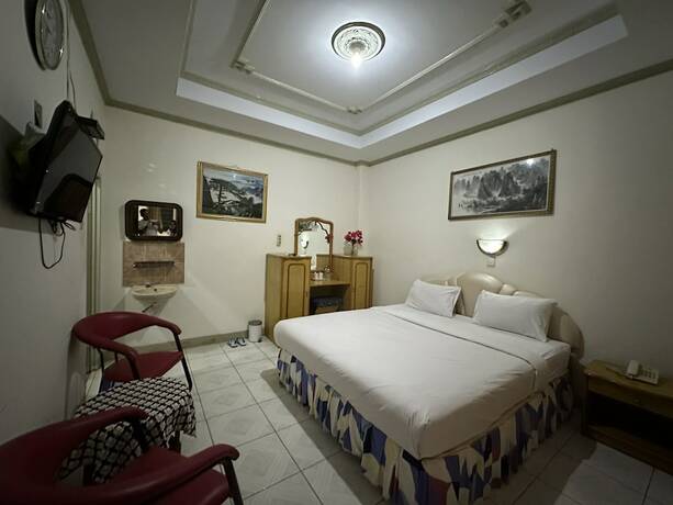 Imagen de la habitación del Hotel Capital O 93291 Bintang. Foto 20
