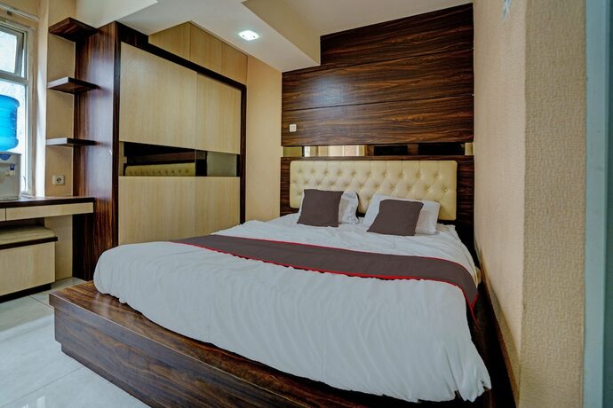 Imagen de la habitación del Hotel Capital O 93344 Gateway Pasteur Apartement By Maestro. Foto 16