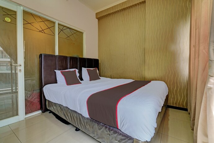 Imagen de la habitación del Hotel Capital O 93344 Gateway Pasteur Apartement By Maestro. Foto 18