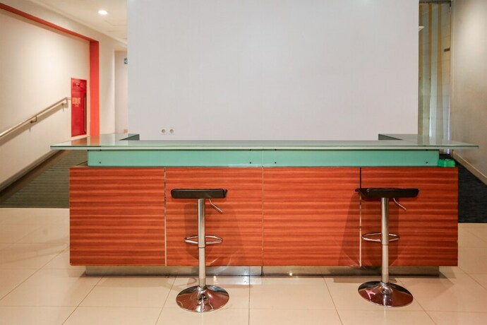 Imagen del bar/restaurante del Hotel Capital O 93347 Glodok Inn By Nam. Foto 15