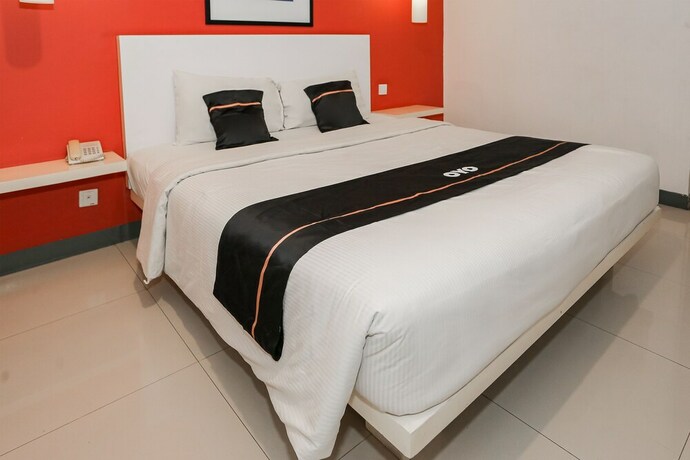 Imagen de la habitación del Hotel Capital O 93347 Glodok Inn By Nam. Foto 16