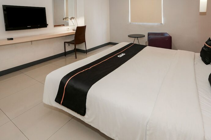 Imagen de la habitación del Hotel Capital O 93347 Glodok Inn By Nam. Foto 22