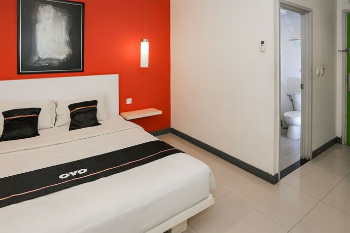 Imagen de la habitación del Hotel Capital O 93347 Glodok Inn By Nam. Foto 24