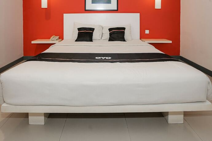 Imagen de la habitación del Hotel Capital O 93347 Glodok Inn By Nam. Foto 26