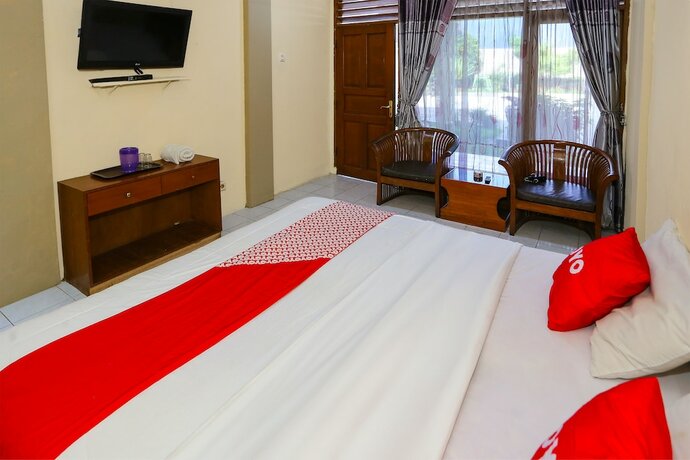 Imagen de la habitación del Hotel Capital O 93349 Gondangdia. Foto 22