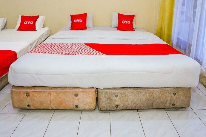 Imagen de la habitación del Hotel Capital O 93349 Gondangdia. Foto 28