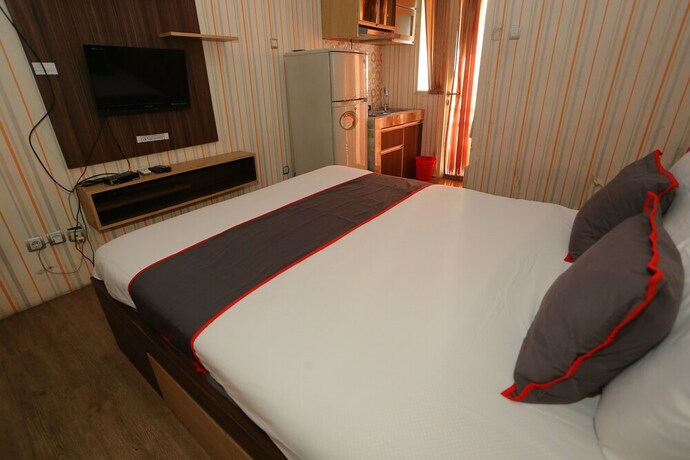 Imagen de la habitación del Hotel Capital O 93371 Pelangi Residence 5. Foto 23