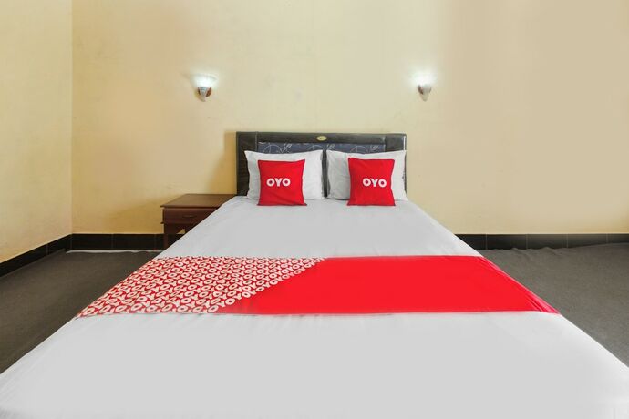 Imagen de la habitación del Hotel Capital O 93391 Golden Manggis. Foto 18