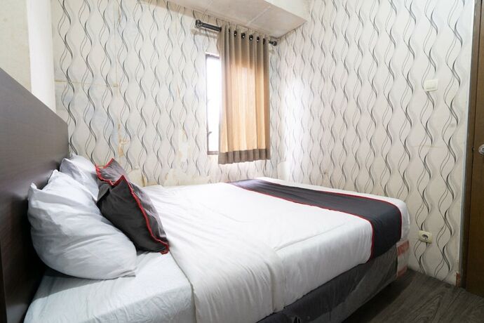 Imagen general del Hotel Capital O 93434 Apartement Gateway Cicadas By MGM II Property. Foto 3