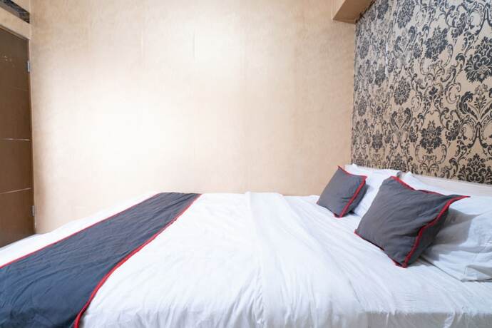 Imagen general del Hotel Capital O 93434 Apartement Gateway Cicadas By MGM II Property. Foto 7