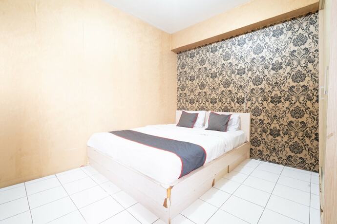 Imagen general del Hotel Capital O 93434 Apartement Gateway Cicadas By MGM II Property. Foto 8
