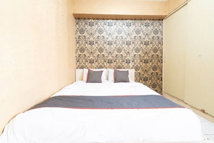 Imagen general del Hotel Capital O 93434 Apartement Gateway Cicadas By MGM II Property. Foto 10