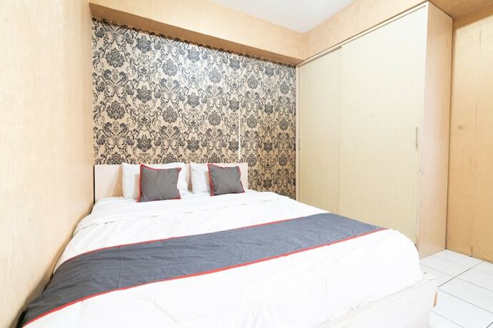 Imagen general del Hotel Capital O 93434 Apartement Gateway Cicadas By MGM II Property. Foto 13