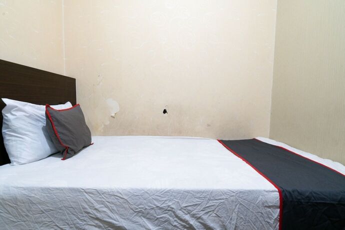 Imagen general del Hotel Capital O 93434 Apartement Gateway Cicadas By MGM II Property. Foto 14