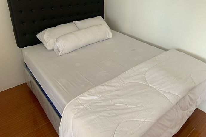 Imagen de la habitación del Hotel Capital O 93437 Embung Banteran Cottage. Foto 20