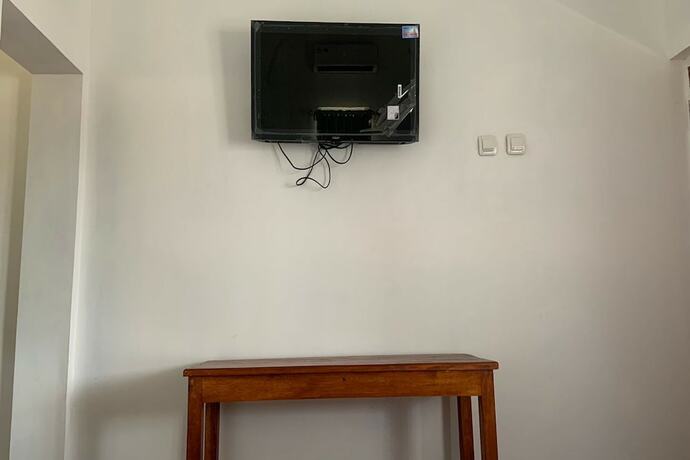 Imagen de la habitación del Hotel Capital O 93437 Embung Banteran Cottage. Foto 26