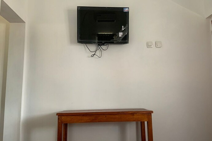 Imagen de la habitación del Hotel Capital O 93437 Embung Banteran Cottage. Foto 28