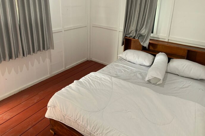 Imagen de la habitación del Hotel Capital O 93437 Embung Banteran Cottage. Foto 29