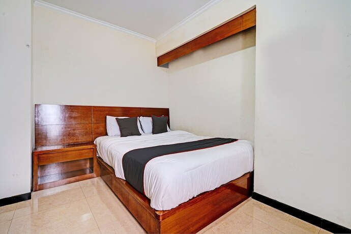 Imagen de la habitación del Hotel Capital O 93455 Apartement Gateway Cicadas By Az Pro Ii. Foto 17