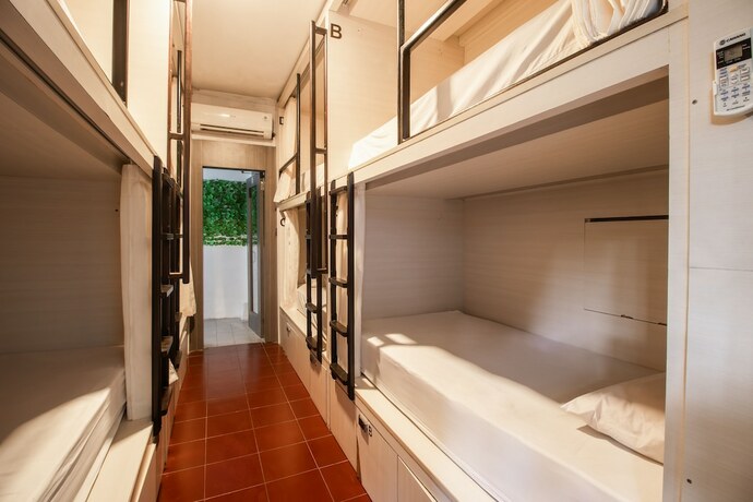 Imagen de la habitación del Hotel Capital O 93486 Anna Inn Kuta. Foto 17