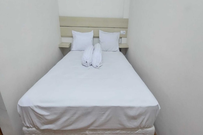 Imagen de la habitación del Hotel Capital O 93489 An Nur Homestay Syariah. Foto 2