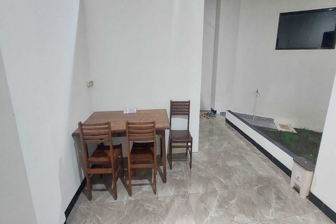 Imagen de los interiores del Hotel Capital O 93489 An Nur Homestay Syariah. Foto 8