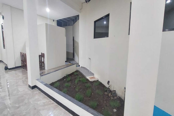 Imagen de los interiores del Hotel Capital O 93489 An Nur Homestay Syariah. Foto 12