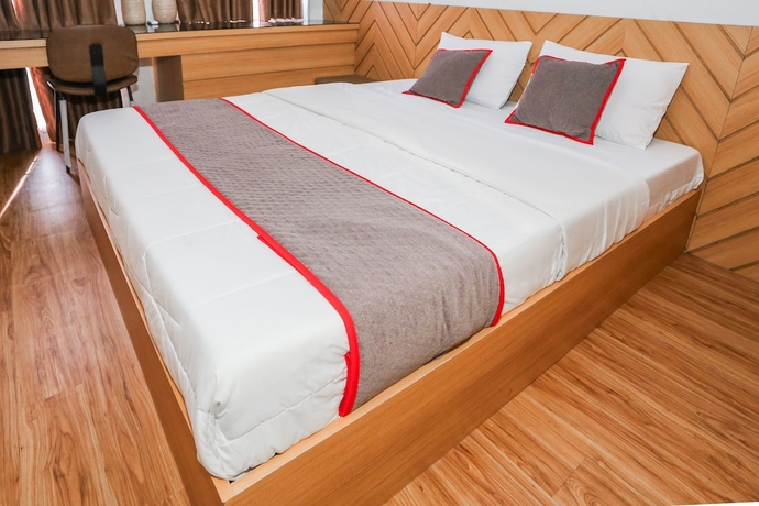Imagen de la habitación del Hotel Capital O 93490 Yubi Room Patraland. Foto 2