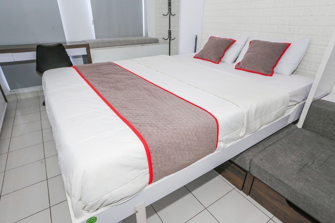 Imagen de la habitación del Hotel Capital O 93490 Yubi Room Patraland. Foto 3