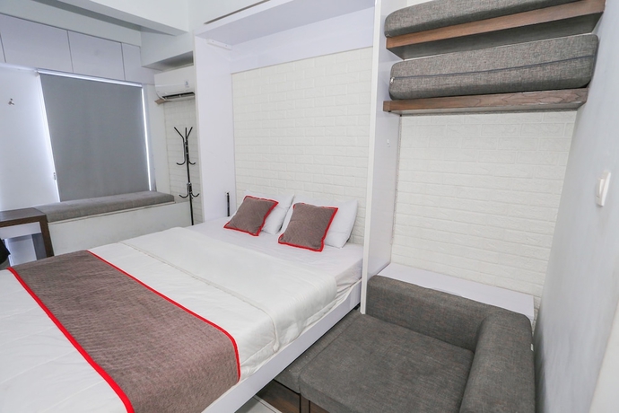Imagen de la habitación del Hotel Capital O 93490 Yubi Room Patraland. Foto 8