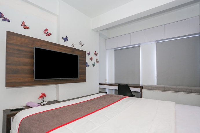 Imagen de la habitación del Hotel Capital O 93490 Yubi Room Patraland. Foto 9