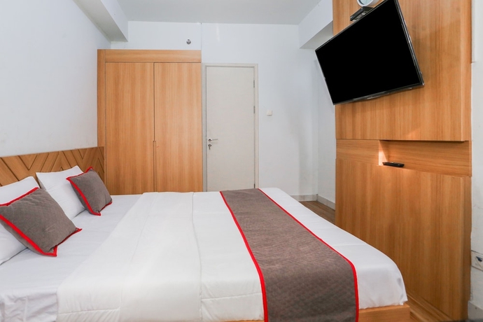 Imagen de la habitación del Hotel Capital O 93490 Yubi Room Patraland. Foto 10