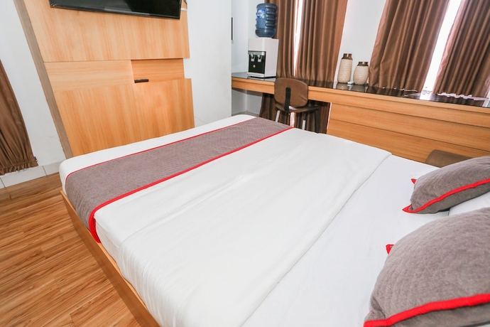 Imagen de la habitación del Hotel Capital O 93490 Yubi Room Patraland. Foto 13