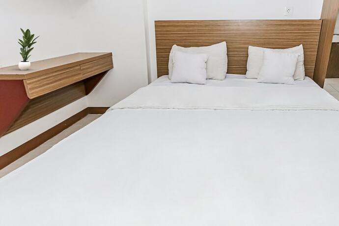 Imagen de la habitación del Hotel Capital O 93516 Loftvilles City Residenc. Foto 19