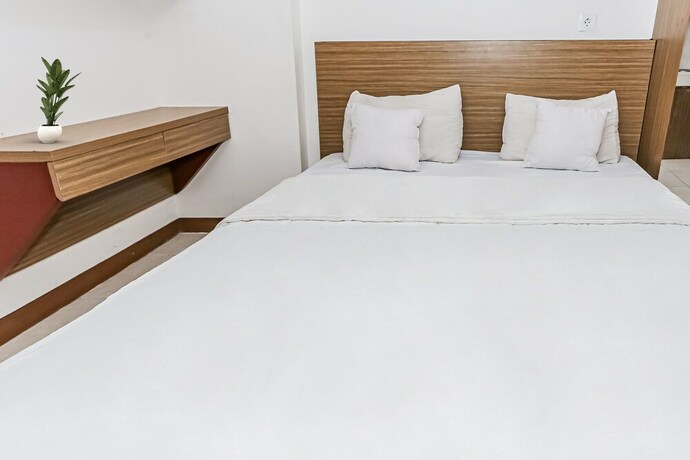 Imagen de la habitación del Hotel Capital O 93516 Loftvilles City Residenc. Foto 21