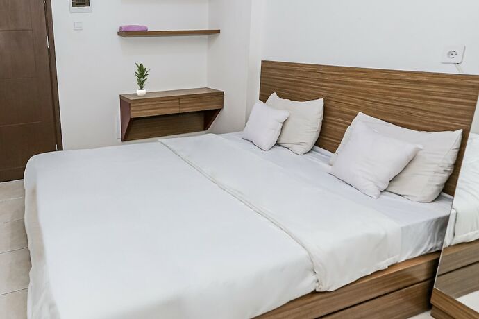 Imagen de la habitación del Hotel Capital O 93516 Loftvilles City Residenc. Foto 23