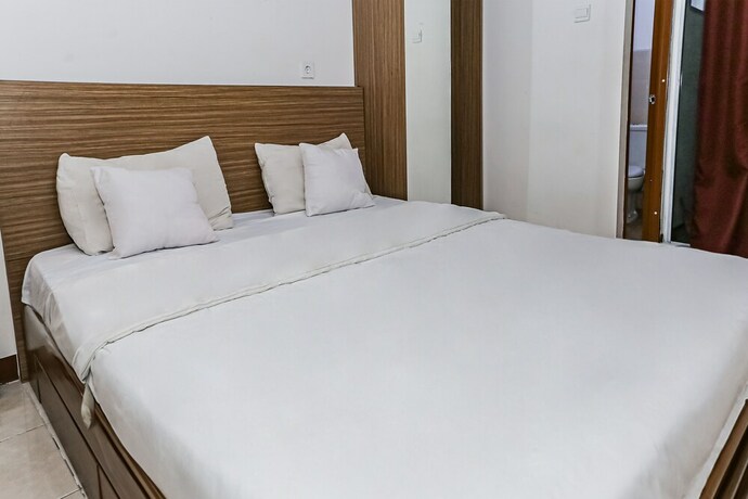 Imagen de la habitación del Hotel Capital O 93516 Loftvilles City Residenc. Foto 24