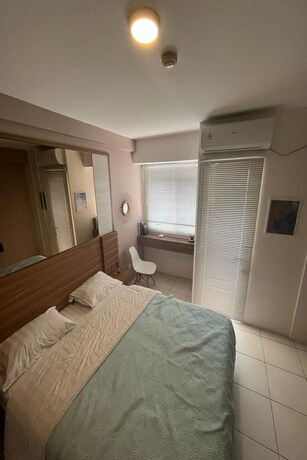 Imagen de la habitación del Hotel Capital O 93529 September House. Foto 24