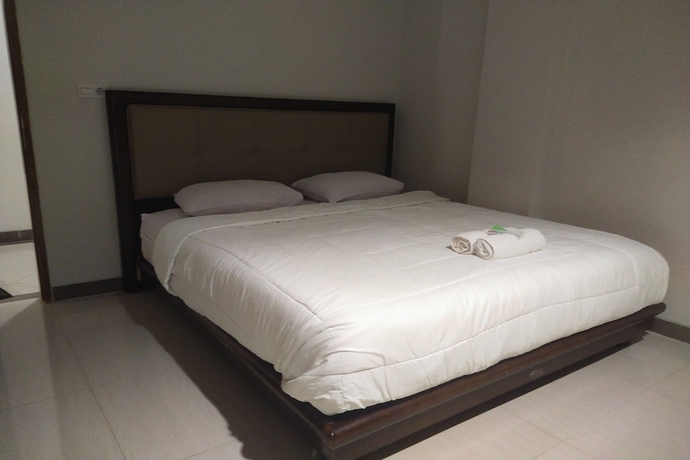 Imagen de la habitación del Hotel Capital O 93589 Wongso Syariah. Foto 5