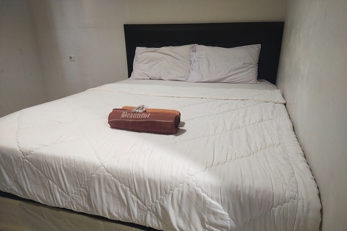 Imagen de la habitación del Hotel Capital O 93589 Wongso Syariah. Foto 8