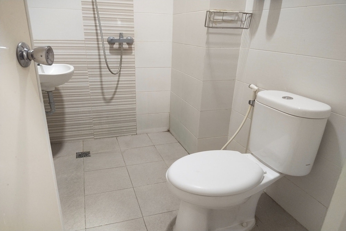 Imagen de la habitación del Hotel Capital O 93589 Wongso Syariah. Foto 14