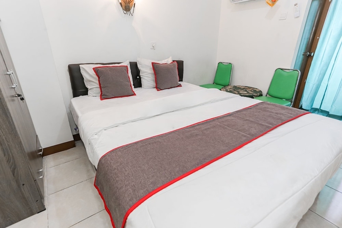 Imagen de la habitación del Hotel Capital O 93593 Pelangi Loftville City. Foto 3