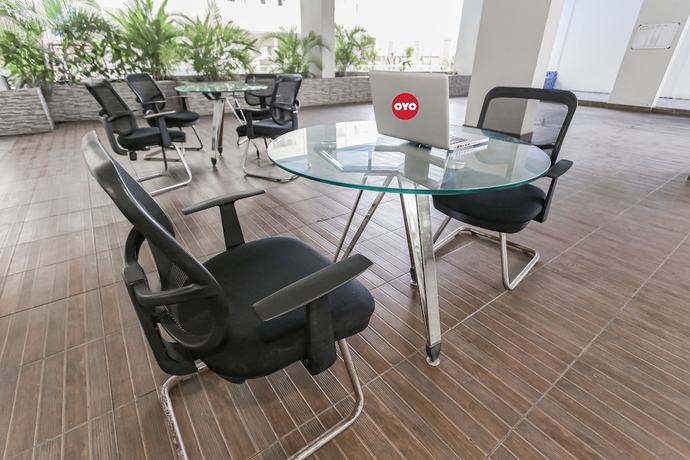 Imagen de los interiores del Hotel Capital O 93593 Pelangi Loftville City. Foto 15