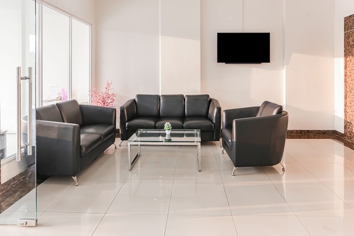 Imagen de los interiores del Hotel Capital O 93593 Pelangi Loftville City. Foto 18