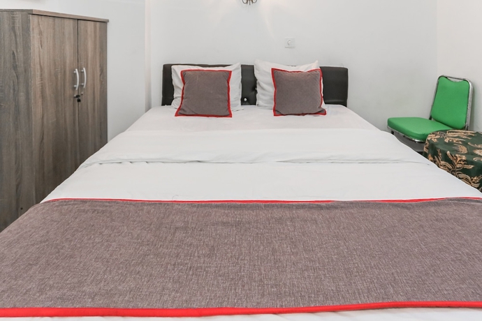Imagen de la habitación del Hotel Capital O 93593 Pelangi Loftville City. Foto 4