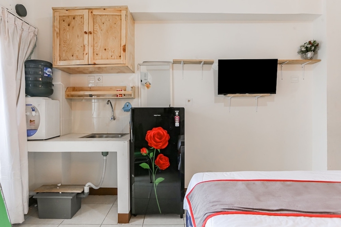 Imagen de la habitación del Hotel Capital O 93593 Pelangi Loftville City. Foto 5