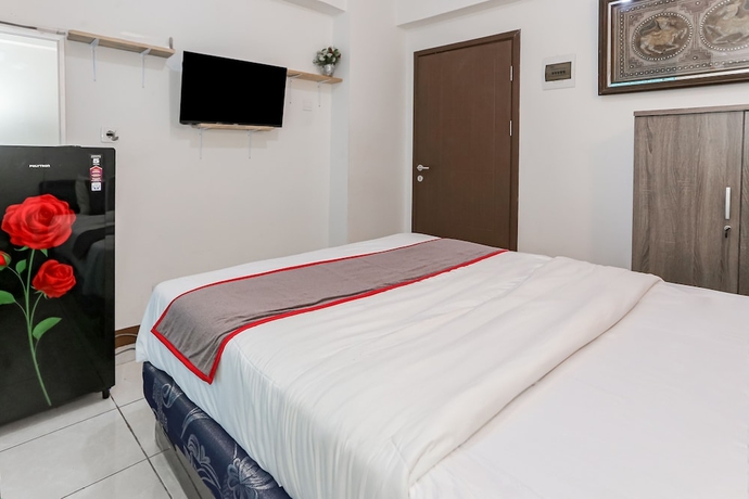 Imagen de la habitación del Hotel Capital O 93593 Pelangi Loftville City. Foto 9