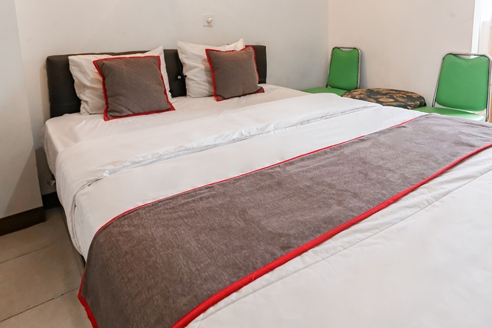 Imagen de la habitación del Hotel Capital O 93593 Pelangi Loftville City. Foto 10