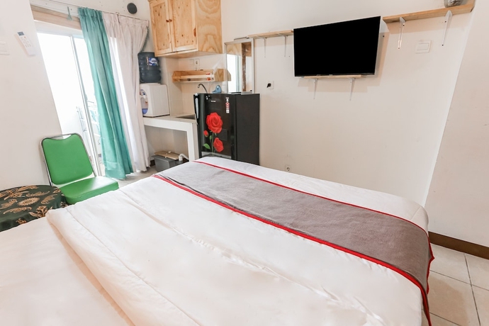Imagen de la habitación del Hotel Capital O 93593 Pelangi Loftville City. Foto 14